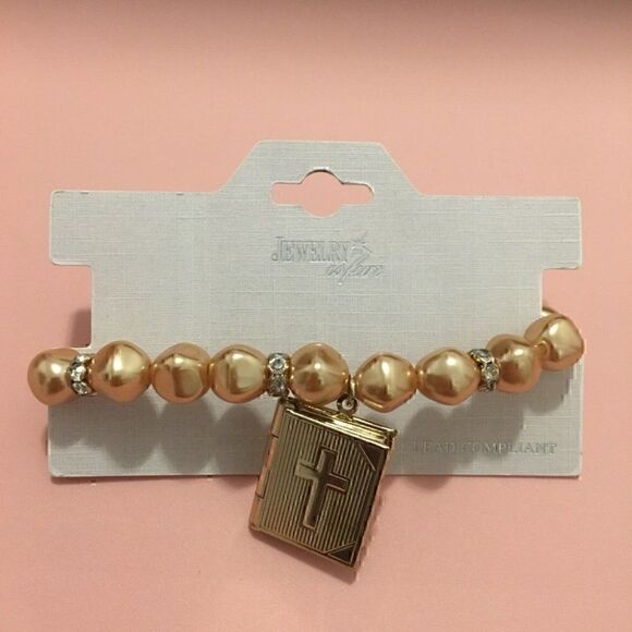 Beaded stretchable bracelet with cross locket - Picture 2 of 3